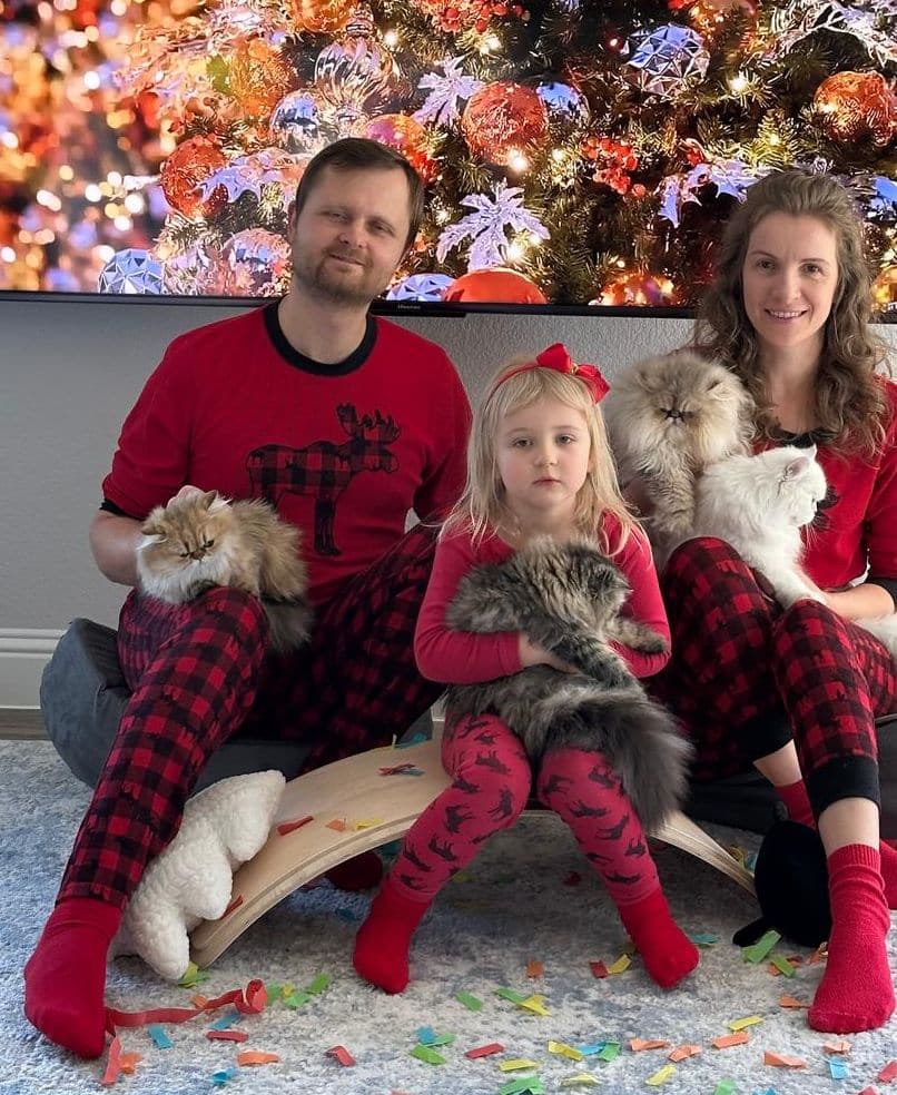 Iryna and family with their Persian cats
